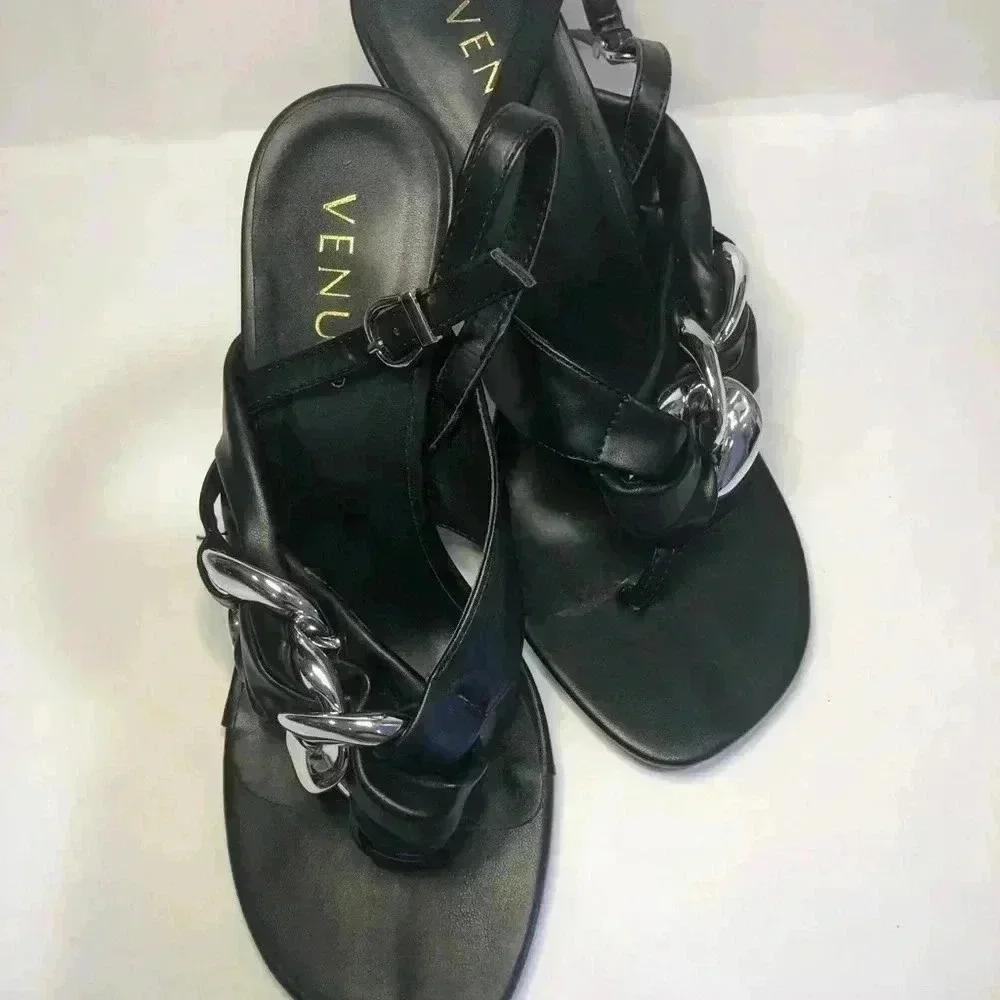 Black and silver heels size 7.5